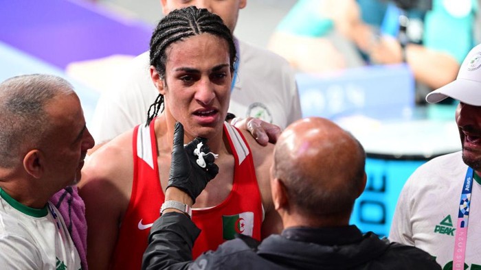 VILLEPINTE, FRANCE - AUGUST 3: Imane Khelif (red) of Team Algeria competes against Anna Luca Hamori (blue) of Team Hungary in the women's 66kg quarter-final boxing match during the Paris 2024 Olympic Games at the North Paris Arena, in Villepinte, France on August 3, 2024. Khelif wins the match and advanced to semi-finals. (Photo by Mehmet Murat Onel/Anadolu via Getty Images)