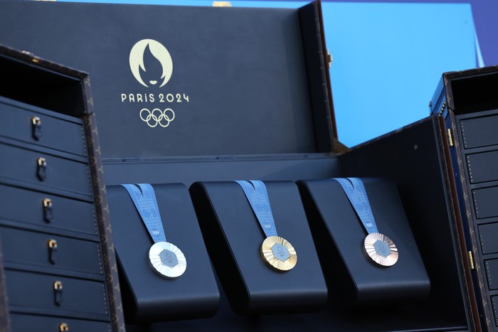 PARIS, FRANCE - AUGUST 05: A detailed view of a Bronze, Silver and Gold medal on display at Champions Park on day ten of the Olympic Games Paris 2024 on August 05, 2024 in Paris, France. (Photo by Arturo Holmes/Getty Images)