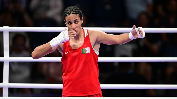 VILLEPINTE, FRANCE - AUGUST 3: Imane Khelif (red) of Team Algeria competes against Anna Luca Hamori (blue) of Team Hungary in the women's 66kg quarter-final boxing match during the Paris 2024 Olympic Games at the North Paris Arena, in Villepinte, France on August 3, 2024. Khelif wins the match and advanced to semi-finals. (Photo by Mehmet Murat Onel/Anadolu via Getty Images)