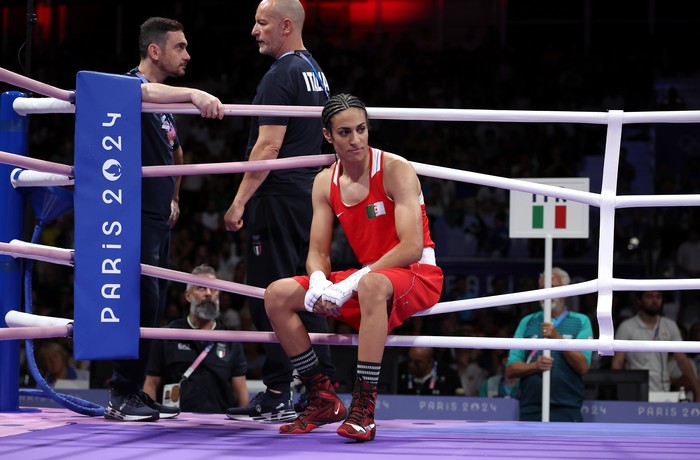 PARIS, FRANCE - AUGUST 01: Imane Khelif of Team Algeria looks on after Angela Carini of Team Italy abandons the Women's 66kg preliminary round match in the first round on day six of the Olympic Games Paris 2024 at North Paris Arena on August 01, 2024 in Paris, France. (Photo by Richard Pelham/Getty Images)