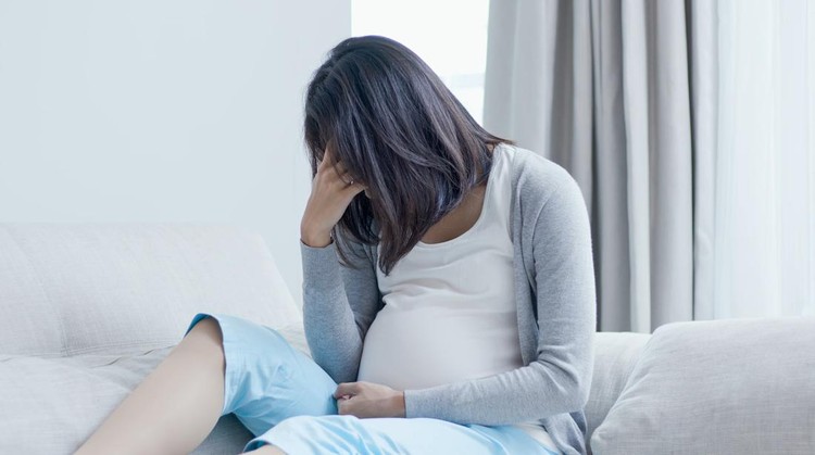 pregnant woman cry and feel depression at home