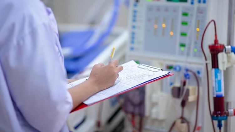 Dialysis nurse are checking dialysis machine before hemodialysis replacement kidney dysfunction or renal failure in intensive care unit.
