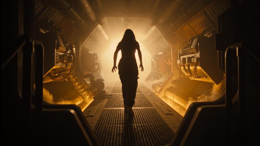(L-R): Xenomorph and Cailee Spaeny as Rain Carradine in 20th Century Studios' ALIEN: ROMULUS. Photo courtesy of 20th Century Studios. © 2024 20th Century Studios. All Rights Reserved.