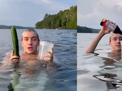 Gokil! Pria Ini Bikin Acar Mentimun Sambil Berenang di Danau