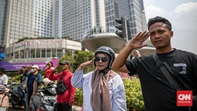 FOTO: Khidmat Pengguna Jalan Bundaran HI Ikuti Pengibaran Bendera
