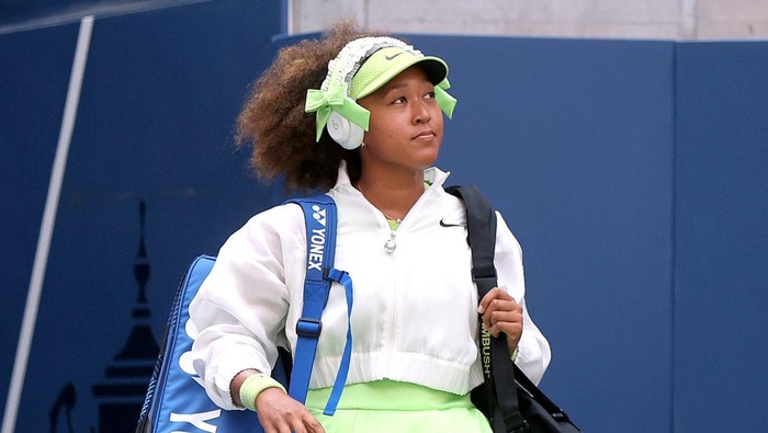 NEW YORK, NEW YORK - AUGUST 27: Naomi Osaka of Japan walks on court before playing against Jelena Ostapenko of Latvia during their Women's Singles First Round match on Day Two of the 2024 US Open at the USTA Billie Jean King National Tennis Center on August 27, 2024 in the Flushing neighborhood of the Queens borough of New York City. (Photo by Mike Stobe/Getty Images)