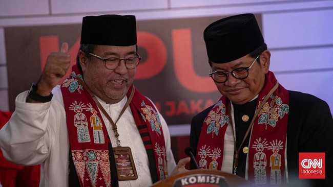 Pasangan Pramono Anung - Rano Karno tiba di JIExpo Kemayoran, menjelang debat perdana Pilkada Jakarta pada malam ini, Minggu (6/10).