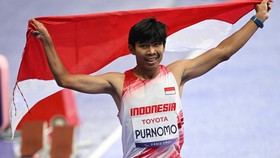 FOTO: Kibaran Merah Putih saat Saptoyogo Rebut Medali Pertama