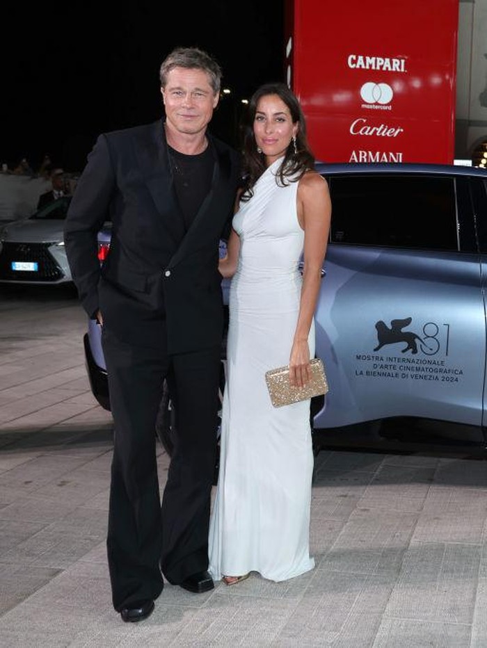 VENICE, ITALY - SEPTEMBER 01: Brad Pitt and Ines de Ramon attends the red carpet of the 