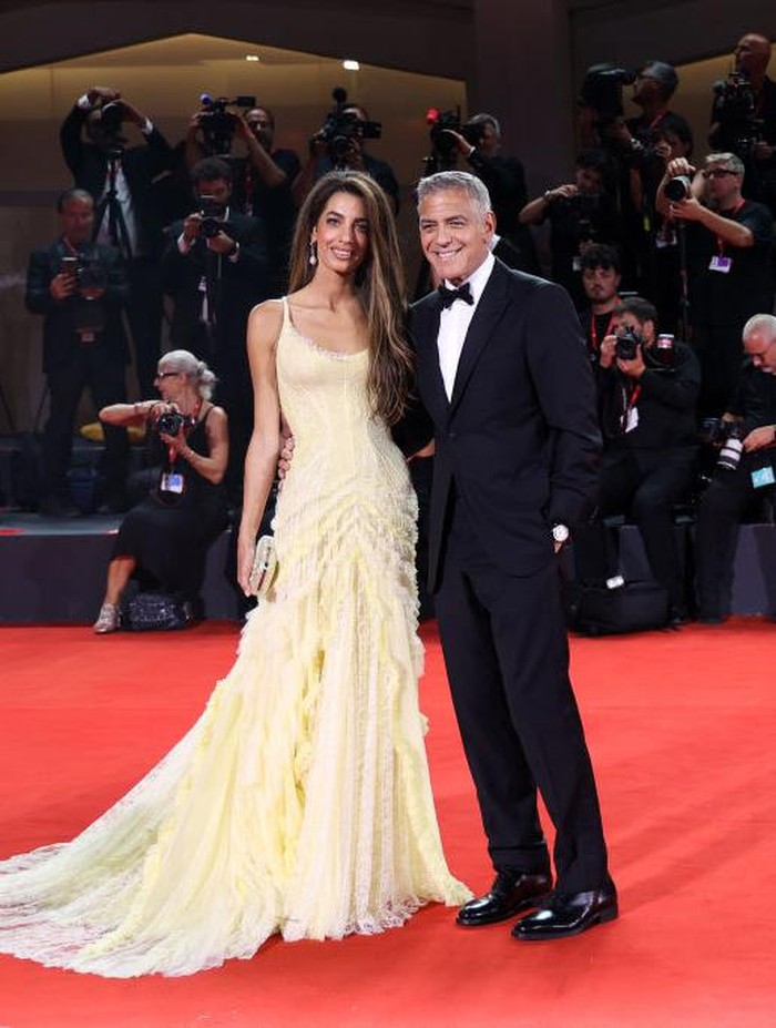 VENICE, ITALY - SEPTEMBER 01: Amal Clooney and George Clooney attend the 