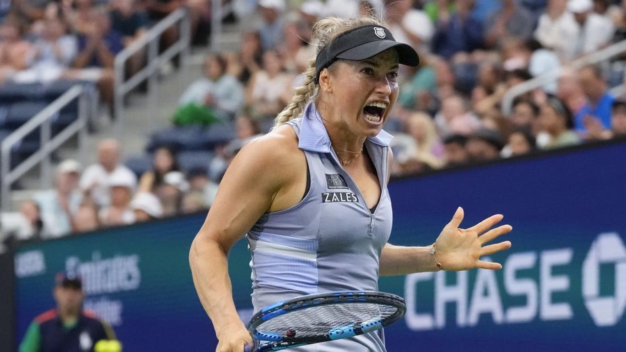 Yulia Putintseva, of Kazakhstan, returns a shot to Jasmine Paolini, of Italy, during the third round of the U.S. Open tennis championships, Saturday, Aug. 31, 2024, in New York. (AP Photo/Kirsty Wigglesworth)