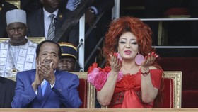 Cameroon President Paul Biya (L), and his wife Chantal Biya (R), react during the May 20 parade marking the 52nd celebration of Unity Day in Yaounde on May 20, 2024. The National Day of Cameroon, also known as Unity Day, celebrates the national refer
