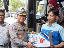 Ditlantas Polda Riau Sosialisasi Pilkada-Bagikan 8 Ribu Paket Sembako