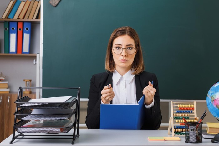 Ilustrasi seorang guru/Foto: Freepik.com/stockking