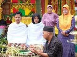 Tradisi Mandi Berdimbar pada Masyarakat Melayu Langkat