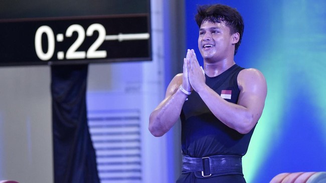 Rizki Juniansyah Sabet 2 Perak dan 1 Perunggu di Kejuaraan Asia Lifter putra Indonesia, Rizki Juniansyah berhasil meraih dua medali perak dan satu perunggu pada Kejuaraan Angkat Besi Asia (AWC) 2025 di China, Senin (12/5).