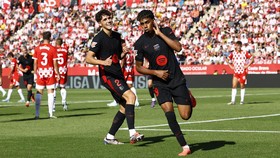 Soccer Football - LaLiga - Girona v FC Barcelona - Estadi Montilivi, Girona, Spain - September 15, 2024 FC Barcelona's Lamine Yamal celebrates scoring their second goal with Pau Cubarsi REUTERS/Albert Gea