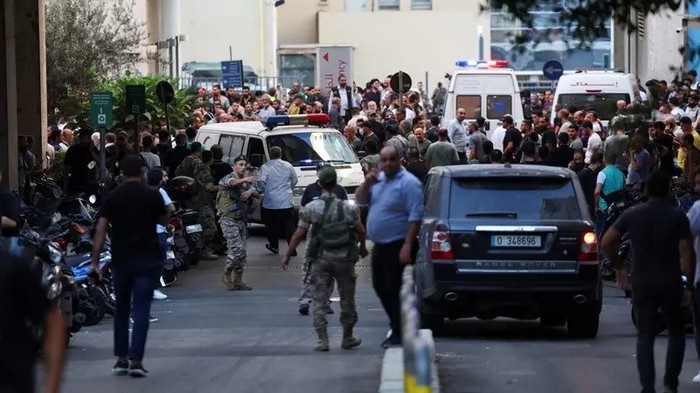 People gather outside a hospital as more than 1,000 people, including Hezbollah fighters and medics, were wounded when the pagers they use to communicate exploded across Lebanon, in Beirut, Sept. 17, 2024. (Reuters)
