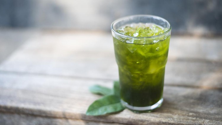 Green Tiliacora Juice in glass.Herb soft drink concetp.
