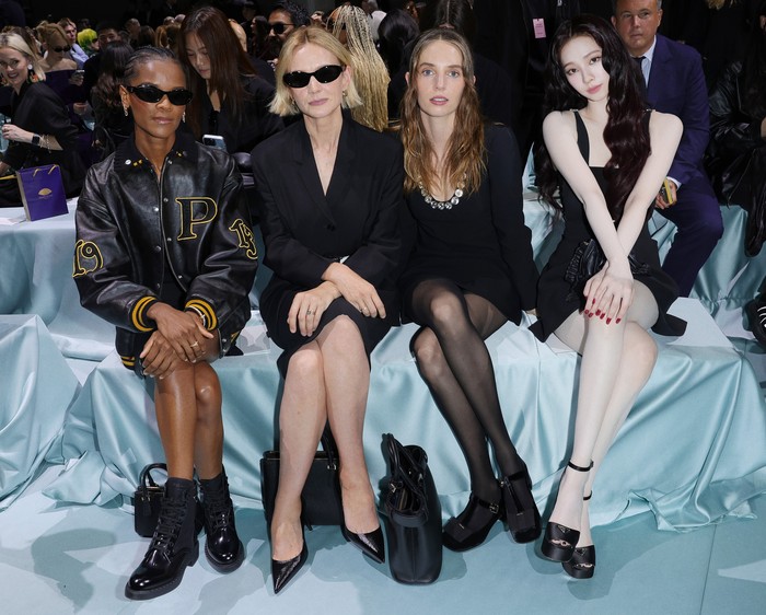 MILAN, ITALY - SEPTEMBER 19: (EDITORS NOTE: This image has been retouched at the request of the subject.) Letitia Wright, Carey Mulligan, Maya Hawke and KARINA attend the Prada Spring/Summer 2025 Womenswear fashion show during Milan Fashion Week Spring/Summer 2025 on September 19, 2024 in Milan, Italy. (Photo by Jacopo Raule/Getty Images for Prada)