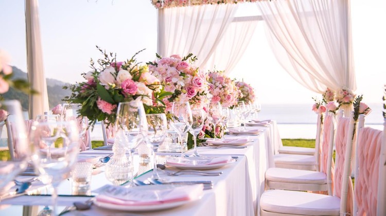 Table setting at a luxury wedding and Beautiful flowers on the table.