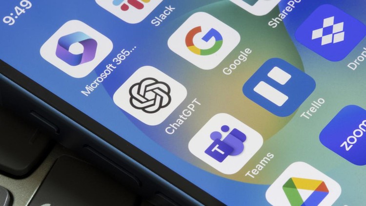 Portland, OR, USA - May 19, 2023: Assorted productivity apps are seen on an iPhone, including ChatGPT, Microsoft 365, Slack, Google, Teams, Trello, Dropbox, Google Drive, and Zoom.