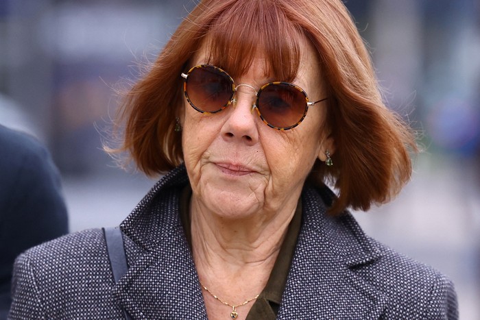 Gisele Pelicot, who has allegedly been drugged and raped by men solicited by her husband Dominique Pelicot at their home in the southern French town of Mazan, arrives during the trial of her husband with 50 co-accused, at the courthouse in Avignon, France, September 30, 2024. REUTERS/Manon Cruz