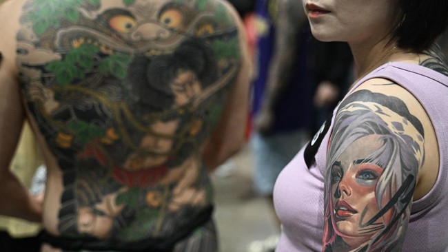 FOTO: Tato Artistik Goresan Seniman di Pameran Tato Internasional