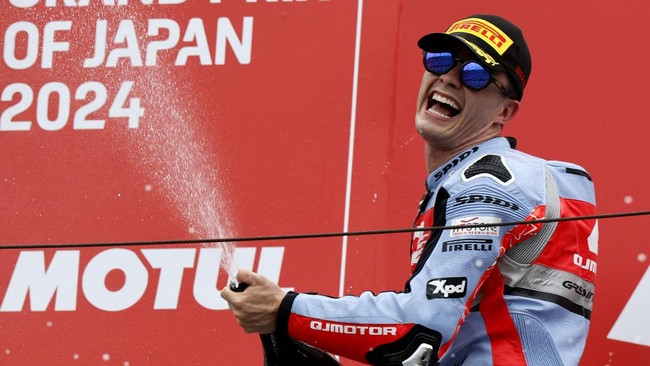 Sponsor tim Gresini Racing QJ Motor ingin pembalap Manuel Gonzalez dipecat usai mengenakan ikat kepala kontroversial di Moto2 Jepang 2024, akhir pekan lalu.