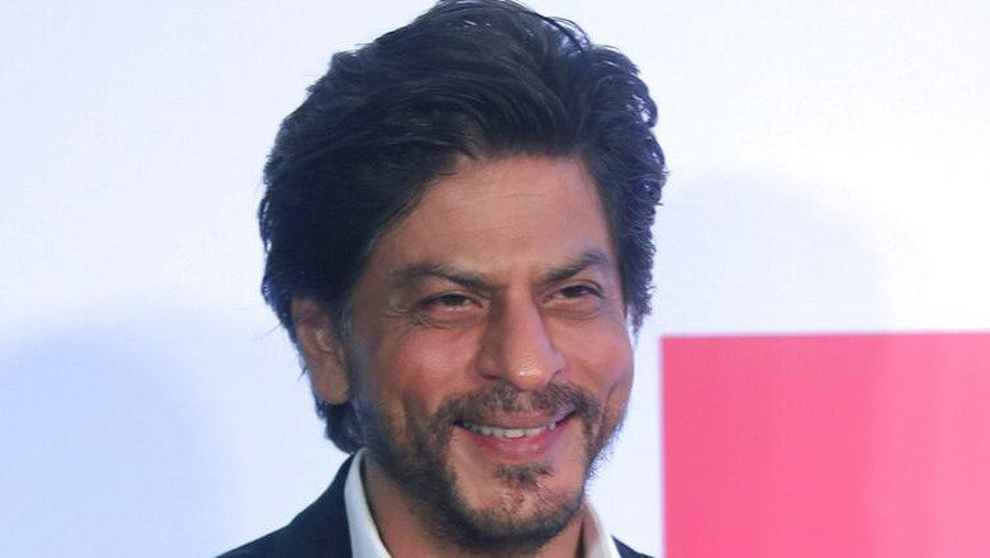 Bollywood actor Shah Rukh Khan greets media as he leaves after presenting the Shah Rukh Khan La Trobe University PhD Scholarship to a student in Mumbai, India, Wednesday, Feb. 26, 2020. (AP Photo/Rafiq Maqbool)