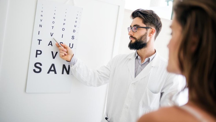 Eye doctor with patient