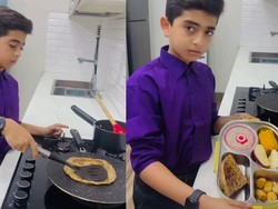Salut! Bocah Ini Bangun Subuh Demi Masak Bekal Sendiri