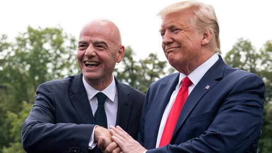 US President Donald Trump shakes hands with FIFA President Gianni Infantino on the South Lawn of the White House in Washington, DC, on September 9, 2019, before he departs for North Carolina. (Photo by NICHOLAS KAMM / AFP)