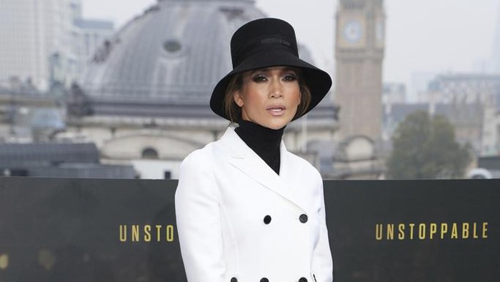 Jennifer Lopez poses for photographers upon arrival at the photo call for the film 'Unstoppable' on Thursday, Nov. 7, 2024, in London. (Photo by Scott A Garfitt/Invision/AP)