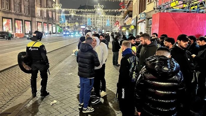 Israeli football supporters and Dutch youth clash near Amsterdam Central station, in Amsterdam, Netherlands, November 8, 2024, in this still image obtained from a social media video. (Reuters)