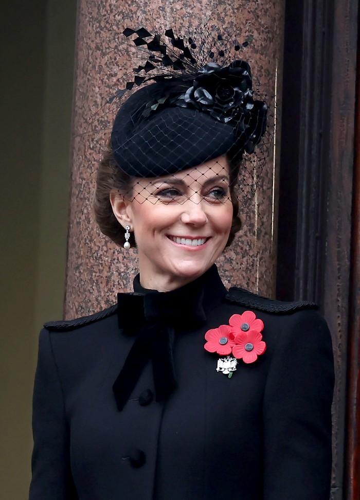 LONDON, ENGLAND - NOVEMBER 10: Catherine, Princess of Wales stands from the balcony during the National Service of Remembrance at The Cenotaph on November 10, 2024 in London, England. Each year members of the British Royal Family join politicians, veterans and members of the public to remember those who have died in combat. (Photo by Chris Jackson/Getty Images)
