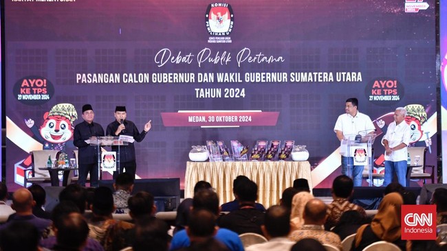 Debat ketiga Pilgub Sumut berlangsung cukup panas. Kedua pasangan calon saling sindir, mengkritik, dan membuka rahasia di panggung debat.