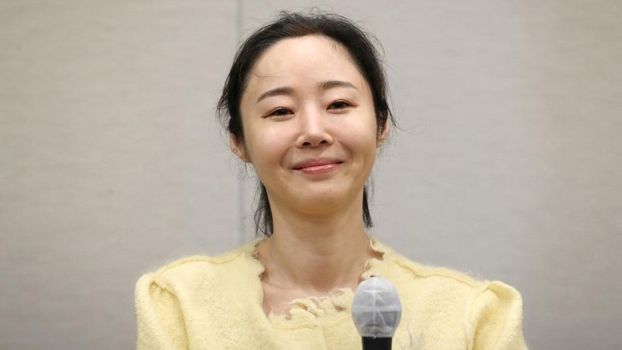 Min Hee-jin, CEO of ADOR, a subsidiary label of K-pop powerhouse HYBE, reacts during a press conference following her company's shareholder meeting in Seoul on May 31, 2024. (Photo by Han Myung-Gu / POOL / AFP)