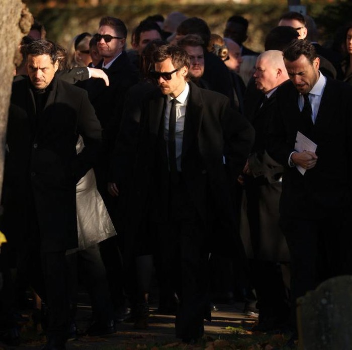 AMERSHAM, ENGLAND - NOVEMBER 20:  Former One Direction band member Harry Styles leaves following the funeral of singer Liam Payne, former member of One Direction, on November 20, 2024 in Amersham, United Kingdom. Former One Direction star Liam Payne's private funeral in Amersham has been widely anticipated to draw celebrities and fans alike, wishing to pay their final respects. The singer died after falling from a hotel balcony in Buenos Aires on October 16. (Photo by Dan Kitwood/Getty Images)
