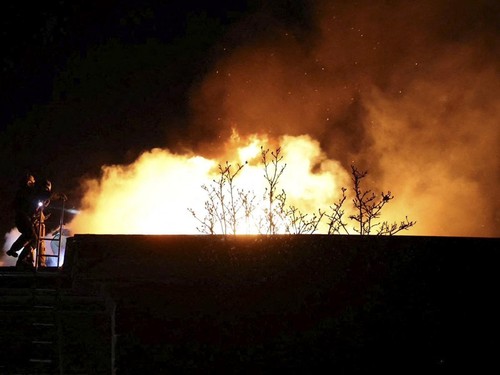 Firefighters work at the site of a Russian missile strike, amid Russia's attack on Ukraine, in Dnipro, Ukraine November 21, 2024. Press service of the State Emergency Service of Ukraine in Dnipropetrovsk region/Handout via REUTERS ATTENTION EDITORS -