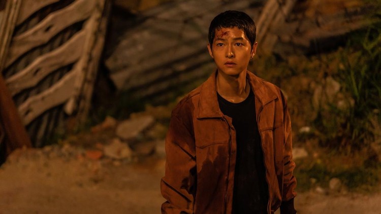 Penampilan Song Joong Ki dalam film Bogota: City Of The Lost. Tayang di bioskop 31 Desember 2024.