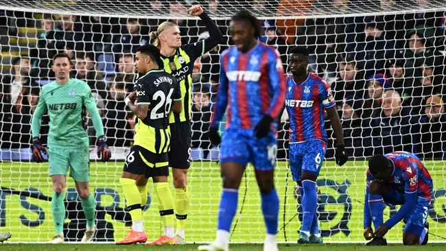 Erling Haaland berhasil mengakhiri puasa gol di Liga Inggris namun Manchester City gagal menang lawan Crystal Palace, Sabtu (7/12).