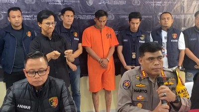 Pria Kaos Merah yang Viral Pukul Mahasiswa Koas Jadi Tersangka