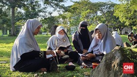 Rapal Doa 20 Tahun Penyintas di Kuburan Massal Korban Tsunami Aceh