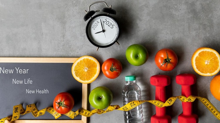 New Year for New Changes Healthy 2025.  Fresh vegetable fruits and healthy food for sport equipment for women diet slimming weight loss.  Healthy and Holiday Concept