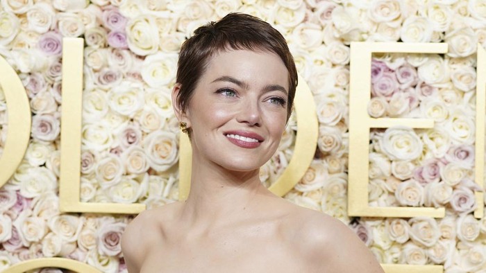 Emma Stone arrives at the 82nd Golden Globes on Sunday, Jan. 5, 2025, at the Beverly Hilton in Beverly Hills, Calif. (Photo by Jordan Strauss/Invision/AP)