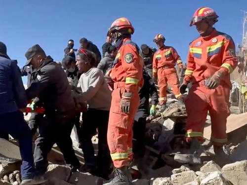 Rescue teams tend to casualties in the aftermath of an earthquake in a location given as Shigatse City, Tibet Autonomous Region, China, January 7, 2025, in this screengrab obtained from a handout video. Tibet Fire and Rescue/Handout via REUTERS    TH
