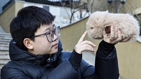 FOTO: Lucunya Robot Peliharaan Punya Muda-mudi China
