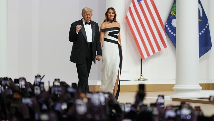 From left, first lady Melania Trump, President Donald Trump, Vice President JD Vance and second lady Usha Vance attend the Commander in Chief Ball, part of the 60th Presidential Inauguration, Monday, Jan. 20, 2025, in Washington. (AP Photo/Ben Curtis)