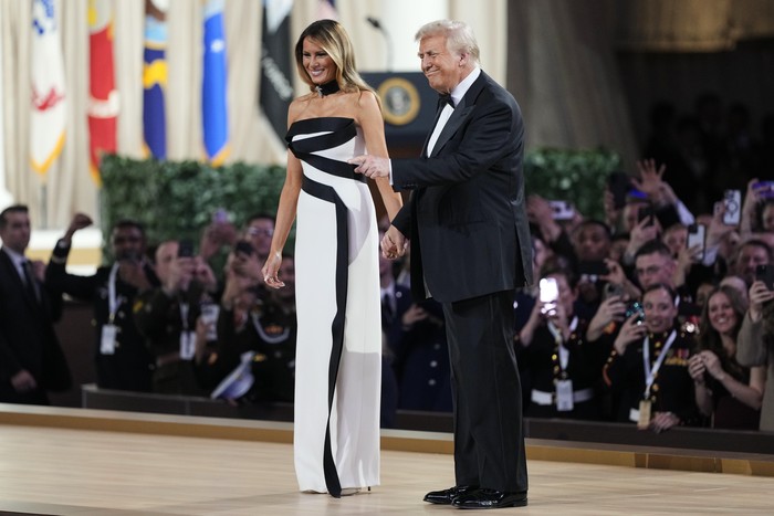 From left, first lady Melania Trump, President Donald Trump, Vice President JD Vance and second lady Usha Vance attend the Commander in Chief Ball, part of the 60th Presidential Inauguration, Monday, Jan. 20, 2025, in Washington. (AP Photo/Ben Curtis)